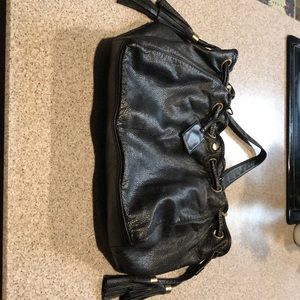 Black Tassled Cinch EUC purse...